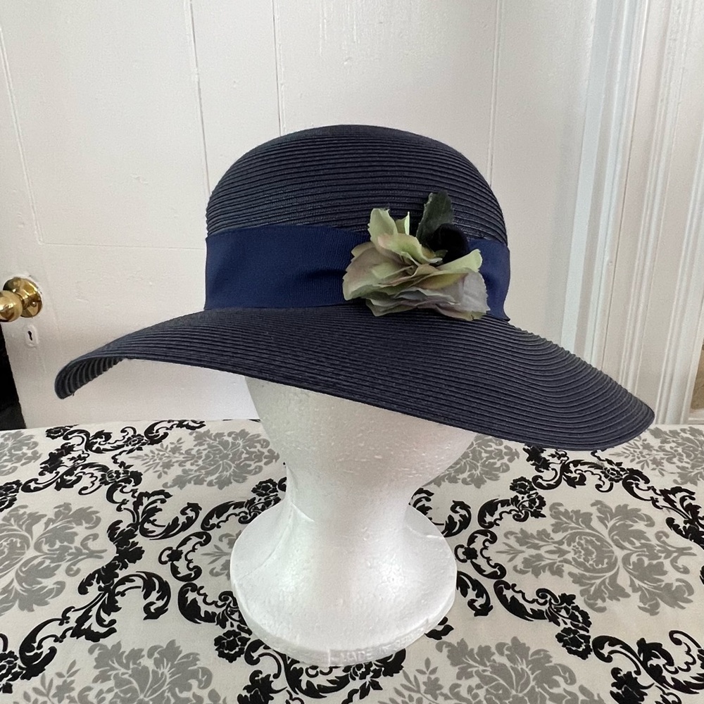 Navy blue sun hat. Purchased in Sienna, Italy. Worn once. One size fits all